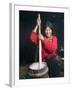 Tibetan Girl Making Butter Tea Inside the Yurt, Dingqing, Tibet, China-Keren Su-Framed Photographic Print