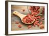 Tibetan Goji Berries (Wolfberry) Spilling of the Glass Jar on a Wooden Spoon, Selective Focus-PixelsAway-Framed Photographic Print