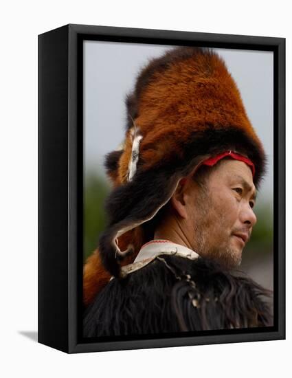 Tibetan Man Wearing Winter Hat, Lijiang, Yunnan Province, China-Pete Oxford-Framed Stretched Canvas