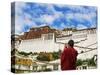 Tibetan Monk with Potala Palace, Lhasa, Tibet, China-Keren Su-Stretched Canvas