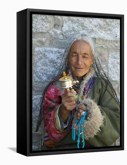 Tibetan Woman Holding Praying Wheel in Sakya Monastery, Tibet, China-Keren Su-Framed Stretched Canvas