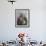 Tibetan Woman Holding Praying Wheel in Sakya Monastery, Tibet, China-Keren Su-Framed Premium Photographic Print displayed on a wall