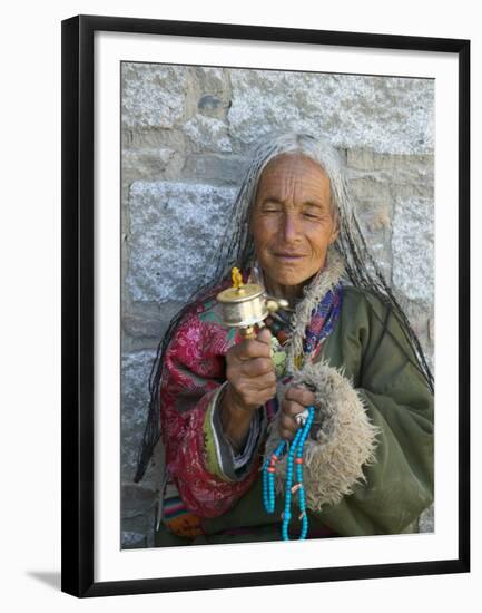 Tibetan Woman Holding Praying Wheel in Sakya Monastery, Tibet, China-Keren Su-Framed Premium Photographic Print