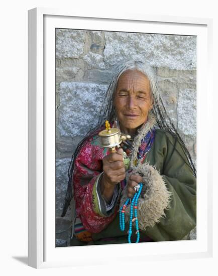 Tibetan Woman Holding Praying Wheel in Sakya Monastery, Tibet, China-Keren Su-Framed Premium Photographic Print