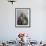 Tibetan Woman Holding Praying Wheel in Sakya Monastery, Tibet, China-Keren Su-Framed Photographic Print displayed on a wall