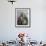 Tibetan Woman Holding Praying Wheel in Sakya Monastery, Tibet, China-Keren Su-Framed Photographic Print displayed on a wall