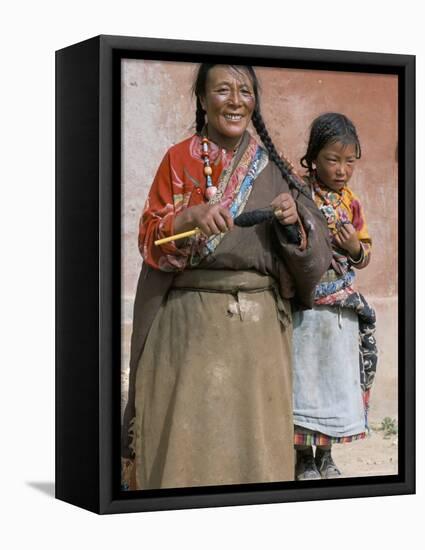 Tibetan Woman Spinning, Qinghai Province, China-Occidor Ltd-Framed Stretched Canvas