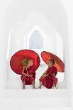 A young Buddhist monk holding a red umbrella walks up the steps in Hsinbyume Pagoda, Mingun, Mandal-Tim Mannakee-Photographic Print