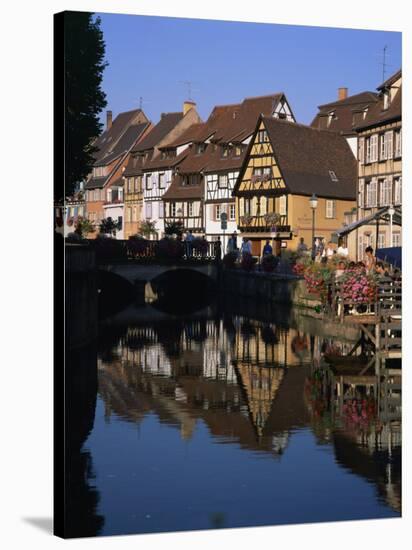 Timbered Houses Reflected in Water in the Evening, Petite Venise, Colmar, Haut-Rhin, Alsace, France-Tomlinson Ruth-Stretched Canvas