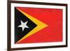 Timor-Leste Flag Design with Wood Patterning - Flags of the World Series-Philippe Hugonnard-Framed Art Print