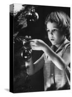 Tina Smith Decorating a Christmas Tree at Guantanamo Naval Base Where Her Dad Is Stationed-John Dominis-Stretched Canvas