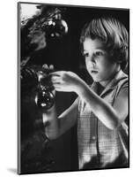 Tina Smith Decorating a Christmas Tree at Guantanamo Naval Base Where Her Dad Is Stationed-John Dominis-Mounted Photographic Print