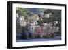 Tiny harbour and medieval houses in steep ravine, Riomaggiore, UNESCO World Heritage Site, Italy-Eleanor Scriven-Framed Photographic Print