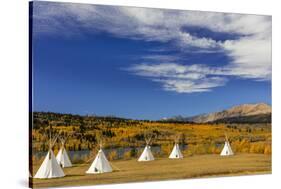 Tipis with Yellow Mountain, St. Mary, Montana, USA-Chuck Haney-Stretched Canvas