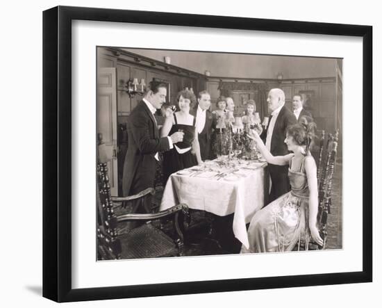 Toasting the Host of Dinner Party-null-Framed Photo