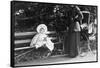 Toddler with Nanny or Mother on a Park Bench, Ca. 1900-null-Framed Stretched Canvas