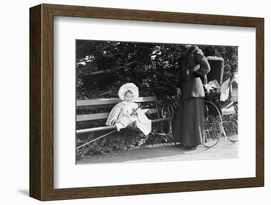 Toddler with Nanny or Mother on a Park Bench, Ca. 1900-null-Framed Photographic Print