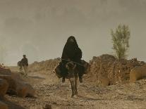 A Woman Rides a Donkey in Bamiyan Province, Central Afghanistan, September 16, 2005-Tomas Munita-Stretched Canvas