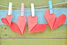 Paper Heart Hanging On The Clothesline. On Old Wood Background-tomgigabite-Framed Art Print