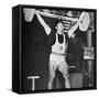 Tommy Kono Winning the Gold Medal for Men's Weightlifting at the 1956 Melbourne Olympics-null-Framed Stretched Canvas