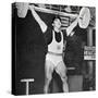 Tommy Kono Winning the Gold Medal for Men's Weightlifting at the 1956 Melbourne Olympics-null-Stretched Canvas