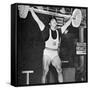 Tommy Kono Winning the Gold Medal for Men's Weightlifting at the 1956 Melbourne Olympics-null-Framed Stretched Canvas