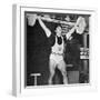 Tommy Kono Winning the Gold Medal for Men's Weightlifting at the 1956 Melbourne Olympics-null-Framed Photographic Print