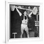 Tommy Kono Winning the Gold Medal for Men's Weightlifting at the 1956 Melbourne Olympics-null-Framed Photographic Print