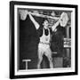 Tommy Kono Winning the Gold Medal for Men's Weightlifting at the 1956 Melbourne Olympics-null-Framed Photographic Print