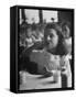 Tooth Powder Being Tested by Schoolgirl in Classroom-Yale Joel-Framed Stretched Canvas