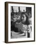 Tooth Powder Being Tested by Schoolgirl in Classroom-Yale Joel-Framed Photographic Print