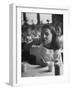 Tooth Powder Being Tested by Schoolgirl in Classroom-Yale Joel-Framed Photographic Print