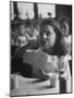 Tooth Powder Being Tested by Schoolgirl in Classroom-Yale Joel-Mounted Photographic Print