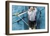 Top View of Athletic Competition Rower, Who Strokes His Paddle through Metallic Blue Water.-mezzotint-Framed Photographic Print