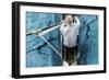 Top View of Athletic Competition Rower, Who Strokes His Paddle through Metallic Blue Water.-mezzotint-Framed Photographic Print