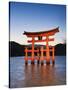 Torii Gate at the Itsukushima Jinga Shrine-Rudy Sulgan-Stretched Canvas