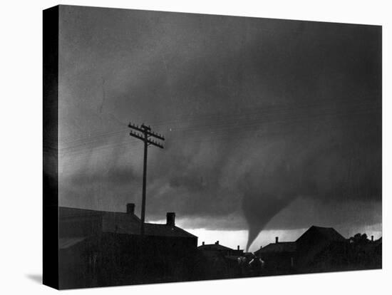 Tornado Moving Past Houses-null-Stretched Canvas