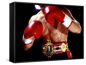 Torso of a Male Boxer Wearing Boxing Gloves and a Belt-null-Framed Stretched Canvas