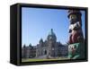 Totem Pole and Parliament Building, Victoria, Vancouver Island, British Columbia, Canada, North Ame-Martin Child-Framed Stretched Canvas