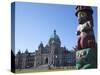 Totem Pole and Parliament Building, Victoria, Vancouver Island, British Columbia, Canada, North Ame-Martin Child-Stretched Canvas