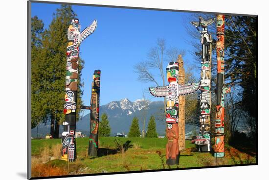 Totem's Poles in Stanley Park-null-Mounted Art Print