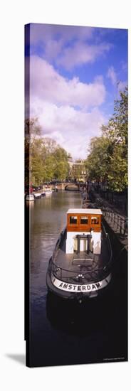 Tourboat Docked in a Channel, Amsterdam, Netherlands-null-Stretched Canvas