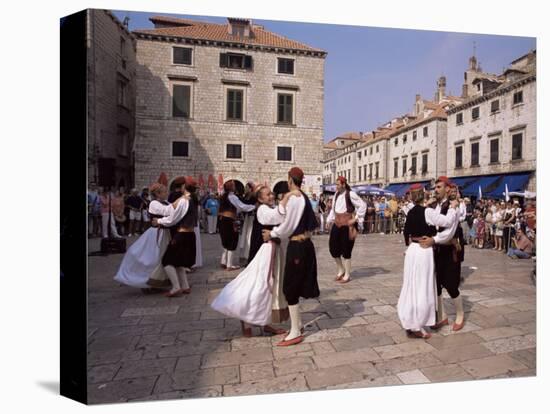 Tourist Board Folk Dancers in Lusa Square, Dubrovnik, Dalmatia, Croatia-Peter Higgins-Stretched Canvas