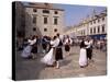 Tourist Board Folk Dancers in Lusa Square, Dubrovnik, Dalmatia, Croatia-Peter Higgins-Stretched Canvas