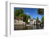 Tourist boat, at the Minnewater Lake and Begijnhof Bridge with entrance to Beguinage, Bruges, Belgi-Peter Barritt-Framed Photographic Print