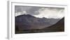 Tourist bus driving among mountains in the Denali National Park, Alaska, United States of America, -JIA JIAHE-Framed Photographic Print