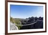 Tourist crossing a rope bridge, Grand Tsingy, Tsingy du Bemaraha National Park, UNESCO World Herita-Christian Kober-Framed Photographic Print