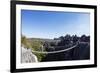 Tourist crossing a rope bridge, Grand Tsingy, Tsingy du Bemaraha National Park, UNESCO World Herita-Christian Kober-Framed Photographic Print