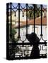 Tourist Gazes at Historic House through Iron Grillwork of Church, Lisbon, Portugal-Merrill Images-Stretched Canvas