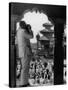 Tourist in Nepal Taking a Picture of a Temple-null-Stretched Canvas